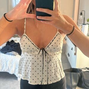 Isabelle’s Cabinet polka dot top